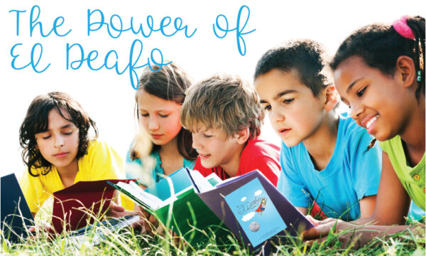 kids laying in grass reading El Deafo books